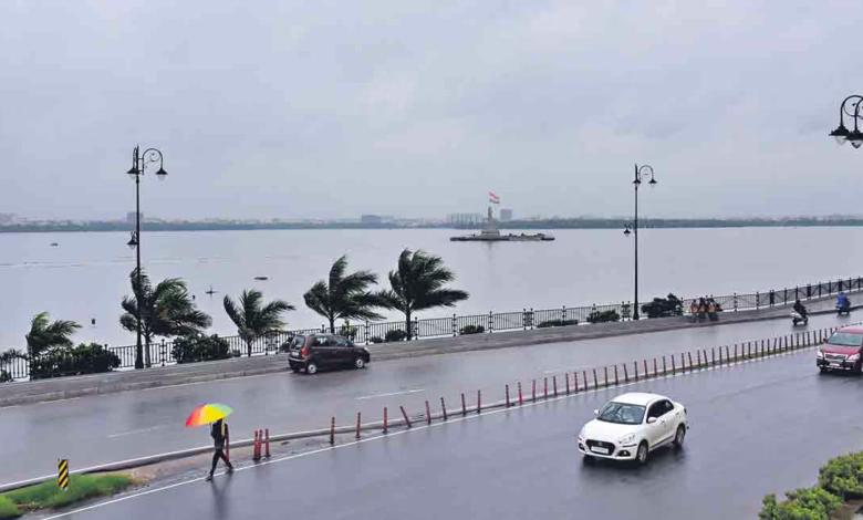 Hyderabad Heavy rainfall fills Hussain Sagar to the brim