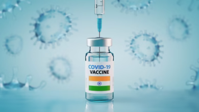 covid 19,coronavirus,vaccine,and,syringe,with,flag,of,india,concept
