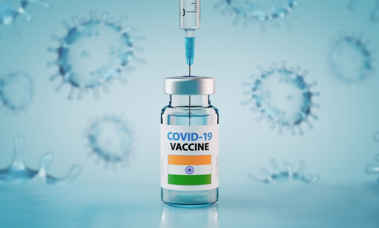 covid 19,coronavirus,vaccine,and,syringe,with,flag,of,india,concept